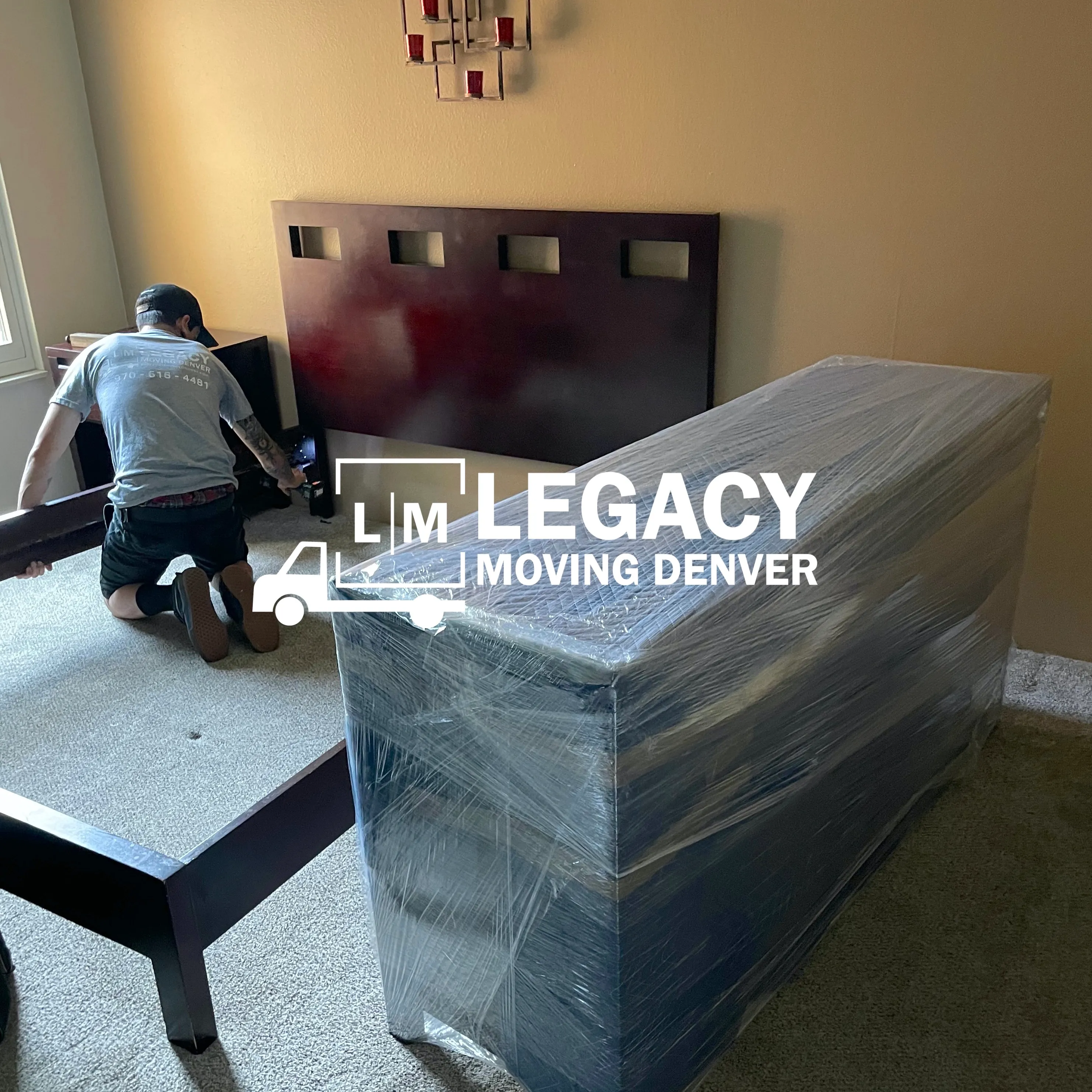 Legacy Moving Denver professional movers packing furniture